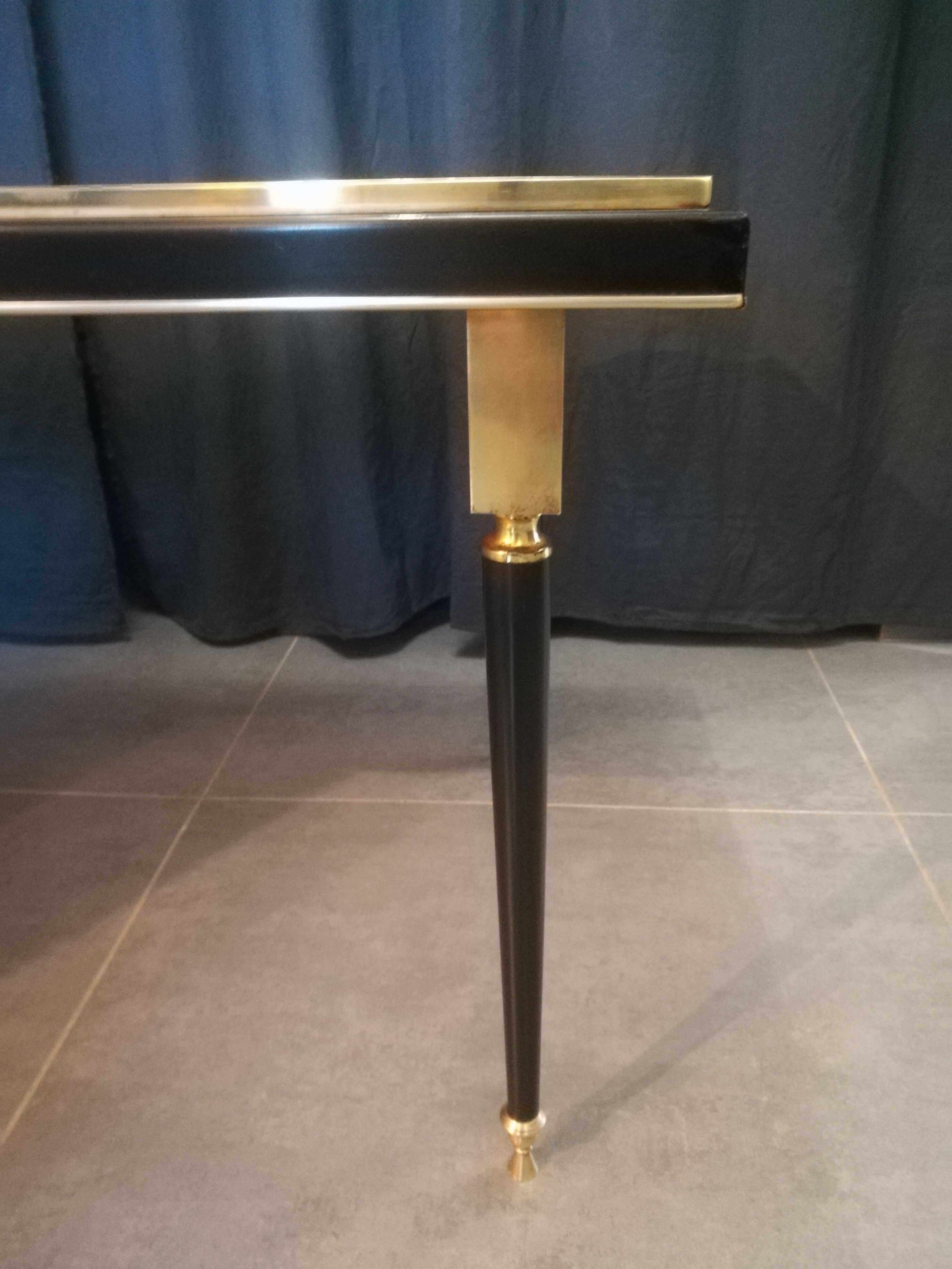 Coffee table in brass and black lacquered metal