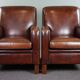 A very beautiful set of 2 Art Deco design armchairs in sheep leather