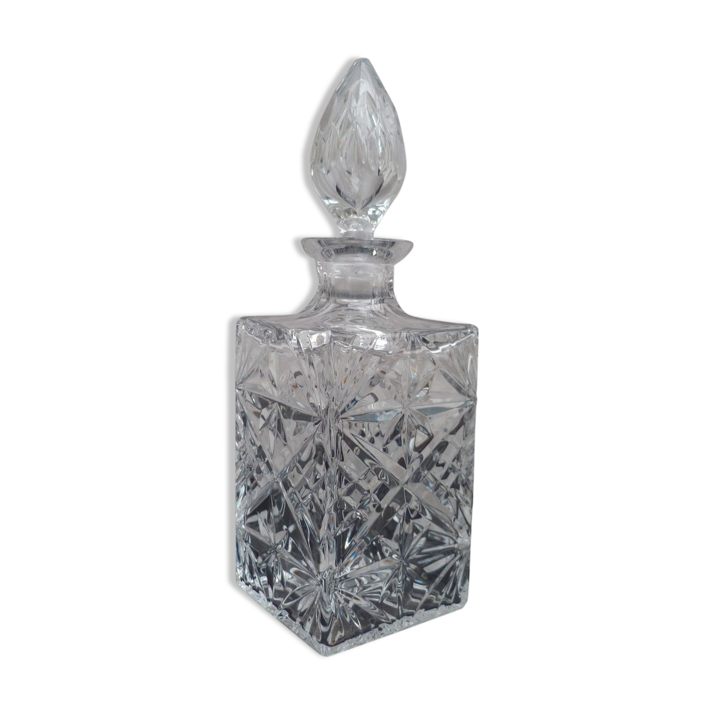 A molded Crystal whiskey decanter