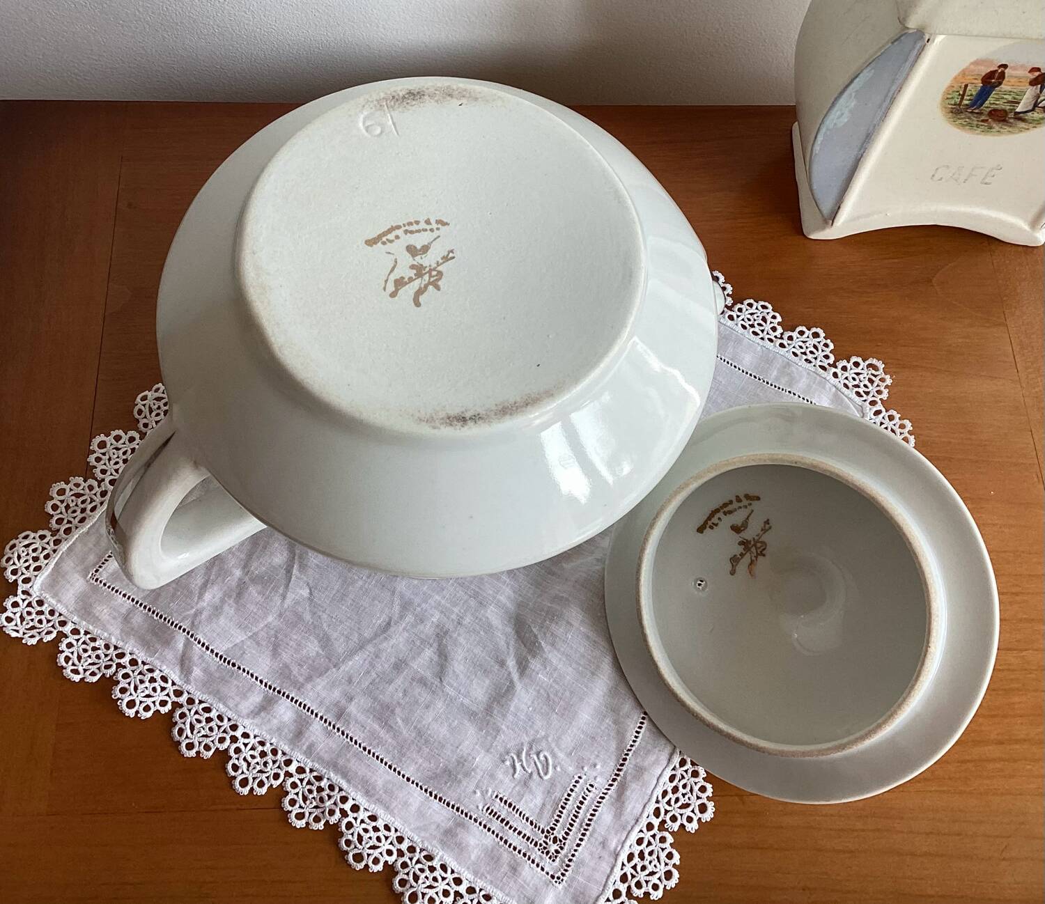 Antique porcelain coffee pot with stamped fire