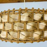Suspension rattan and palm leaves chic jungle style
