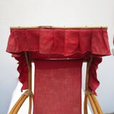 Old rattan doll stroller