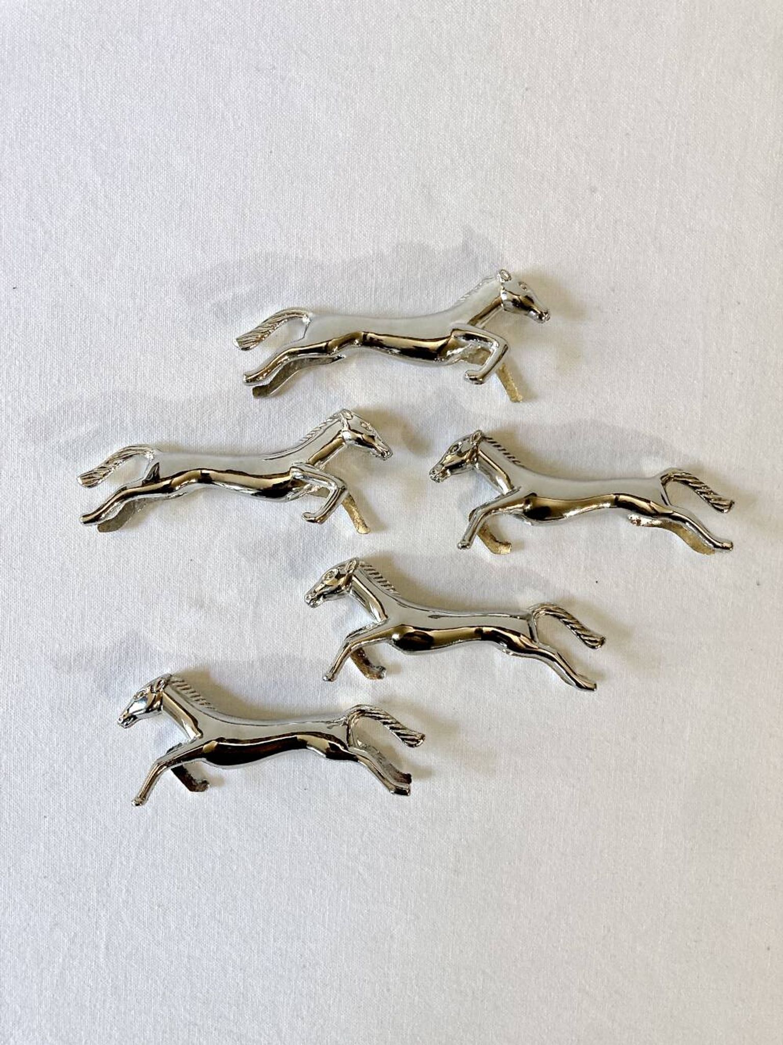 5 silver-plated knife rests in the shape of a horse. 1960s
