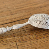 Sprinkler spoon, solid silver
