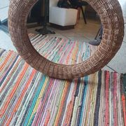 Miroir en rotin de forme sphérique vers 1970