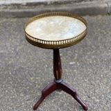 Tripod marble guéridon in gilded Louis XVI style.