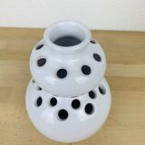 Vase with white ceramic flowers