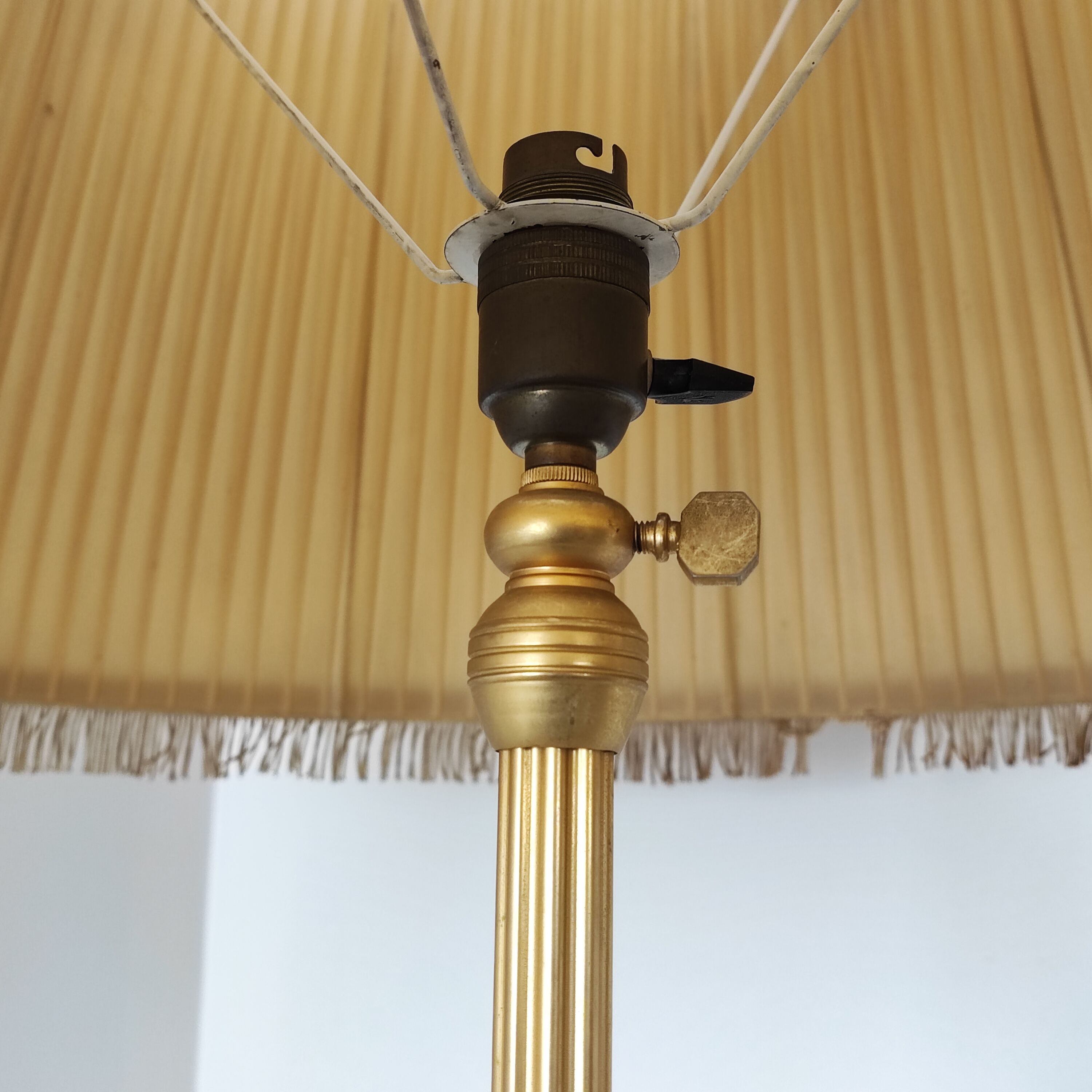 Golden tripod floor lamp