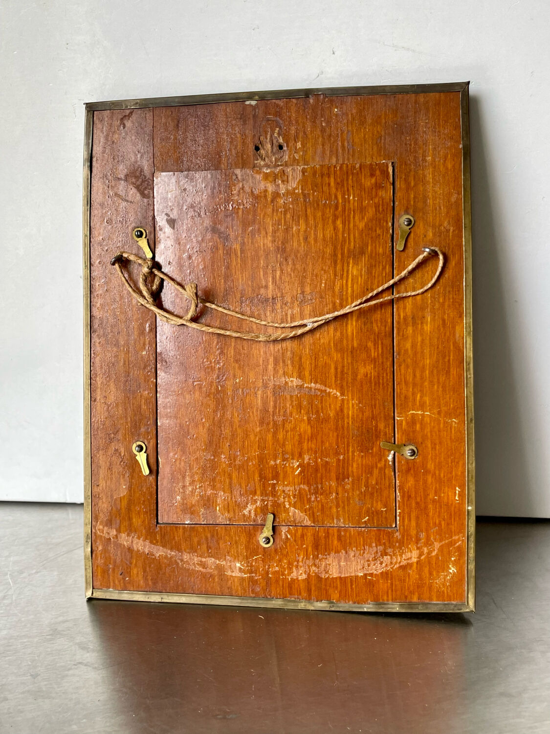 Antique brass metal picture frame in baroque style