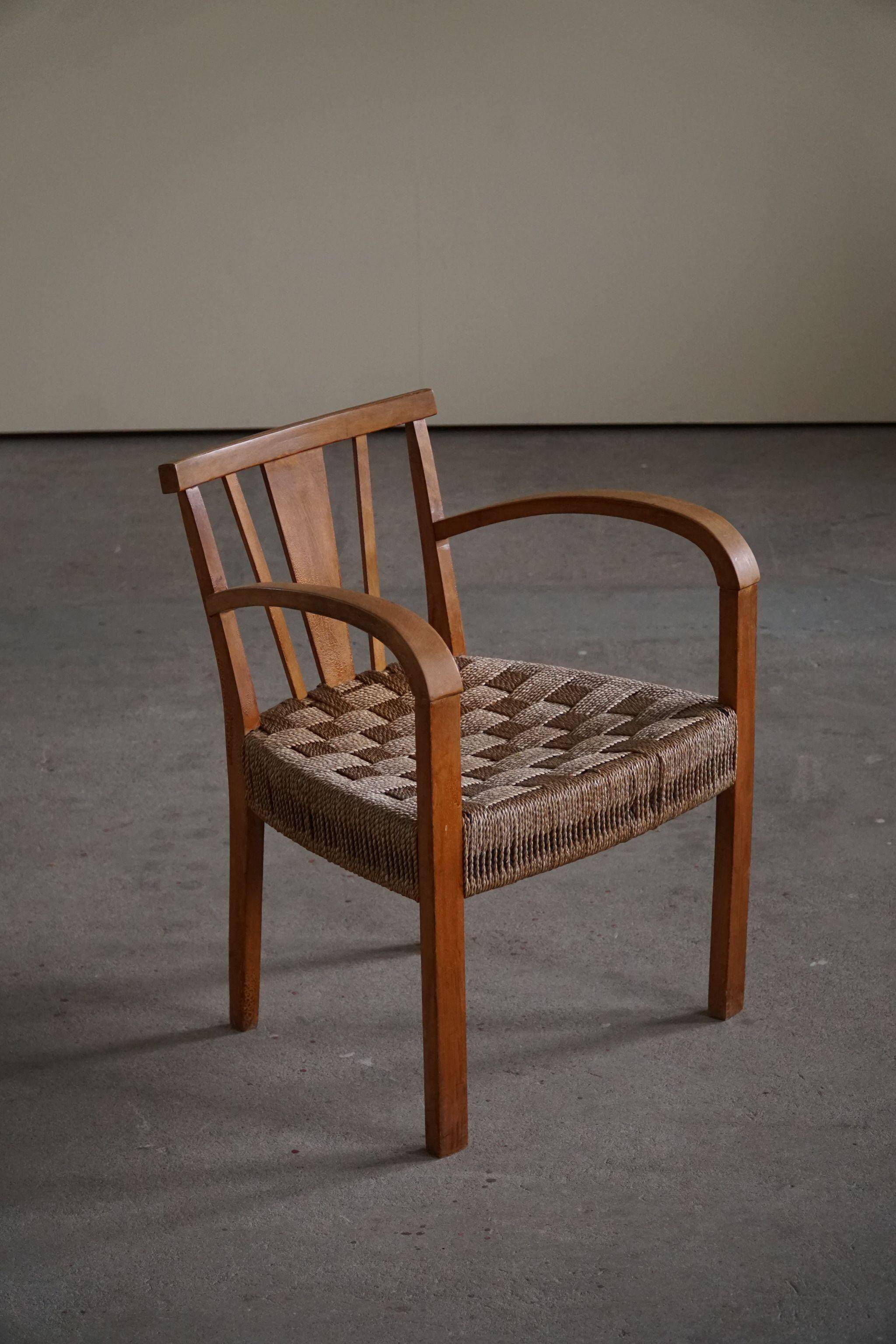 Modern Danish lounge chair in beech and paper cord, in the style of Frits Schlegel.