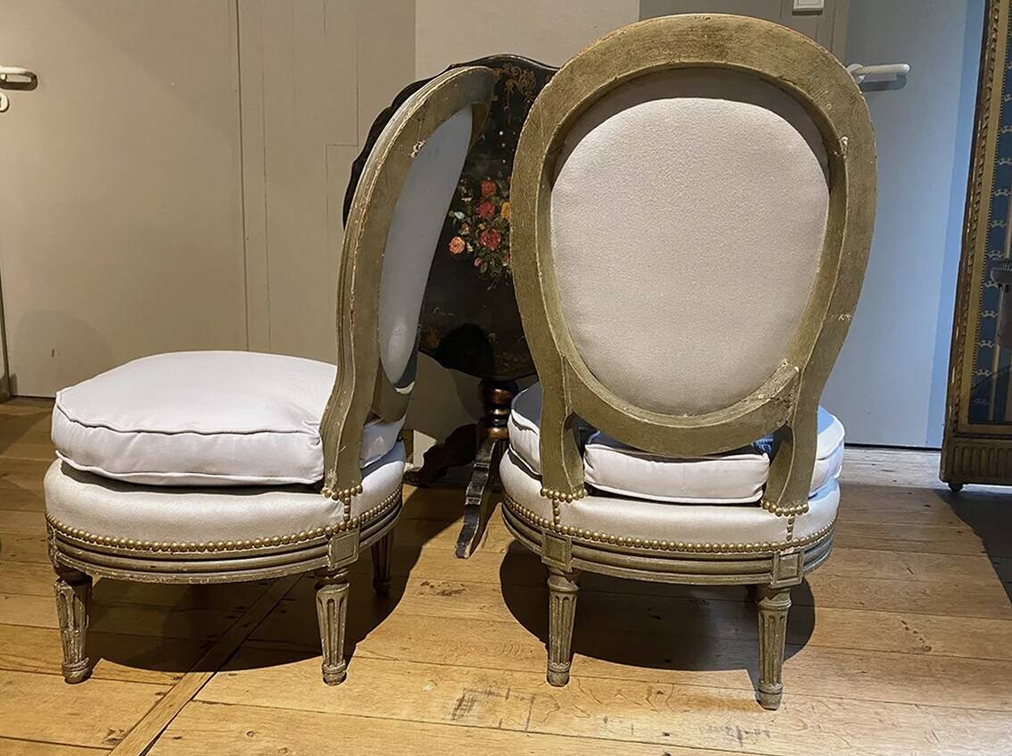 Pair of Louis XVI style armchairs with medallion backs, circa 1900