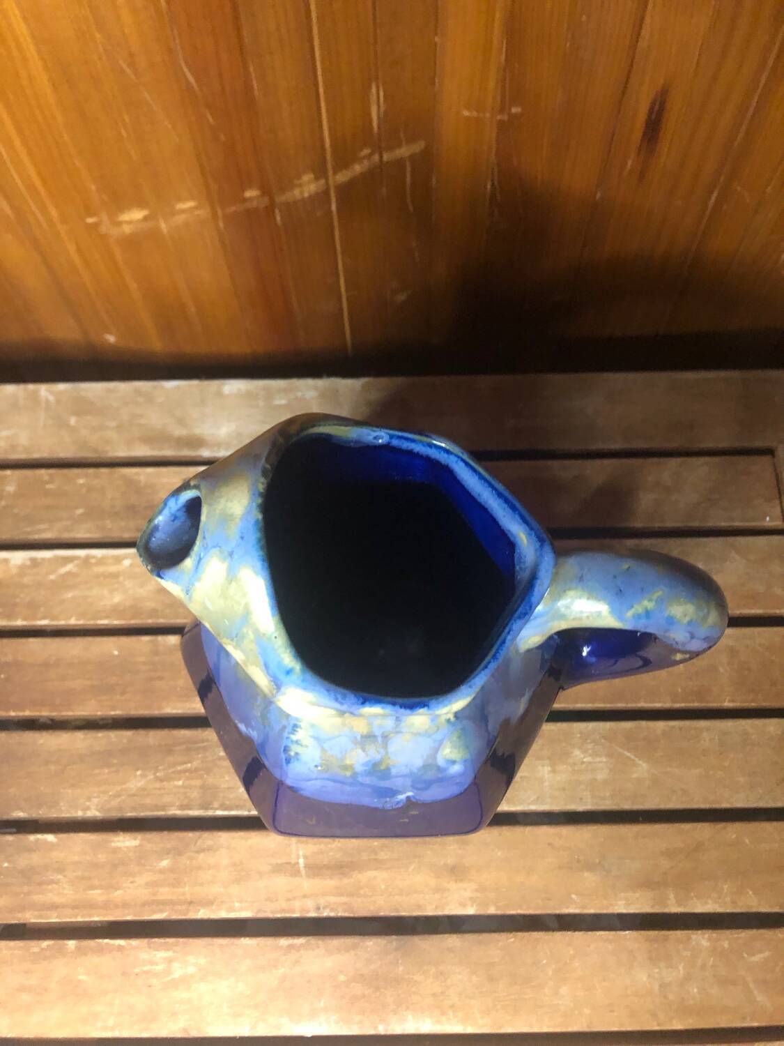 Old vintage blue ceramic pitcher