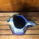 Old vintage blue ceramic pitcher