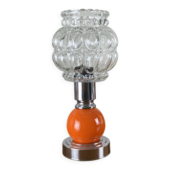 Vintage glass tulip table lamp with a metal base.