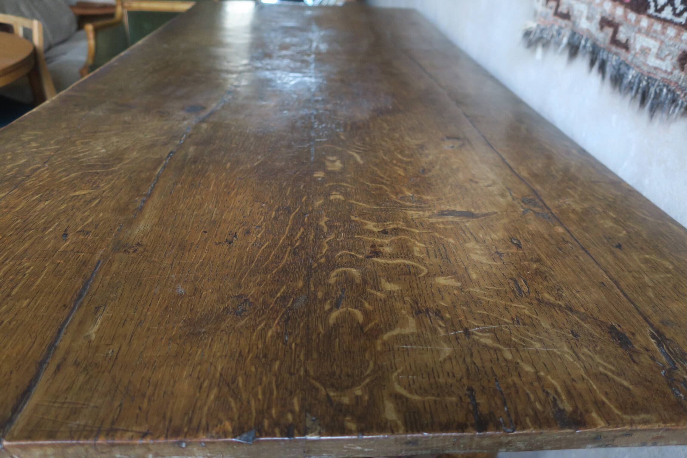 Antique patinated oak dining table, 18th century