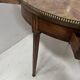 Louis XVI style bouillotte table in veneered wood, 20th century.
