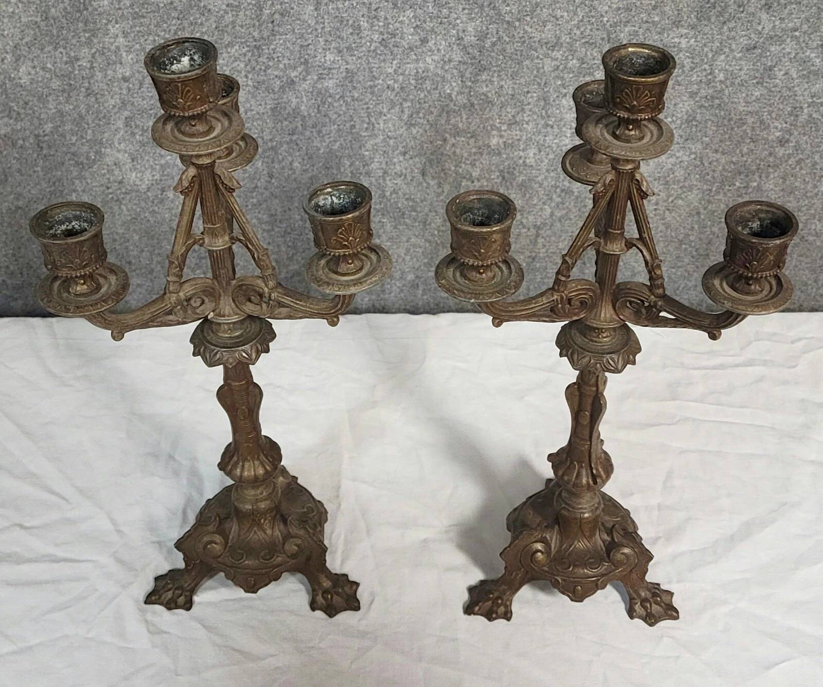 Pair of antique candelabra in patinated bronze spelter