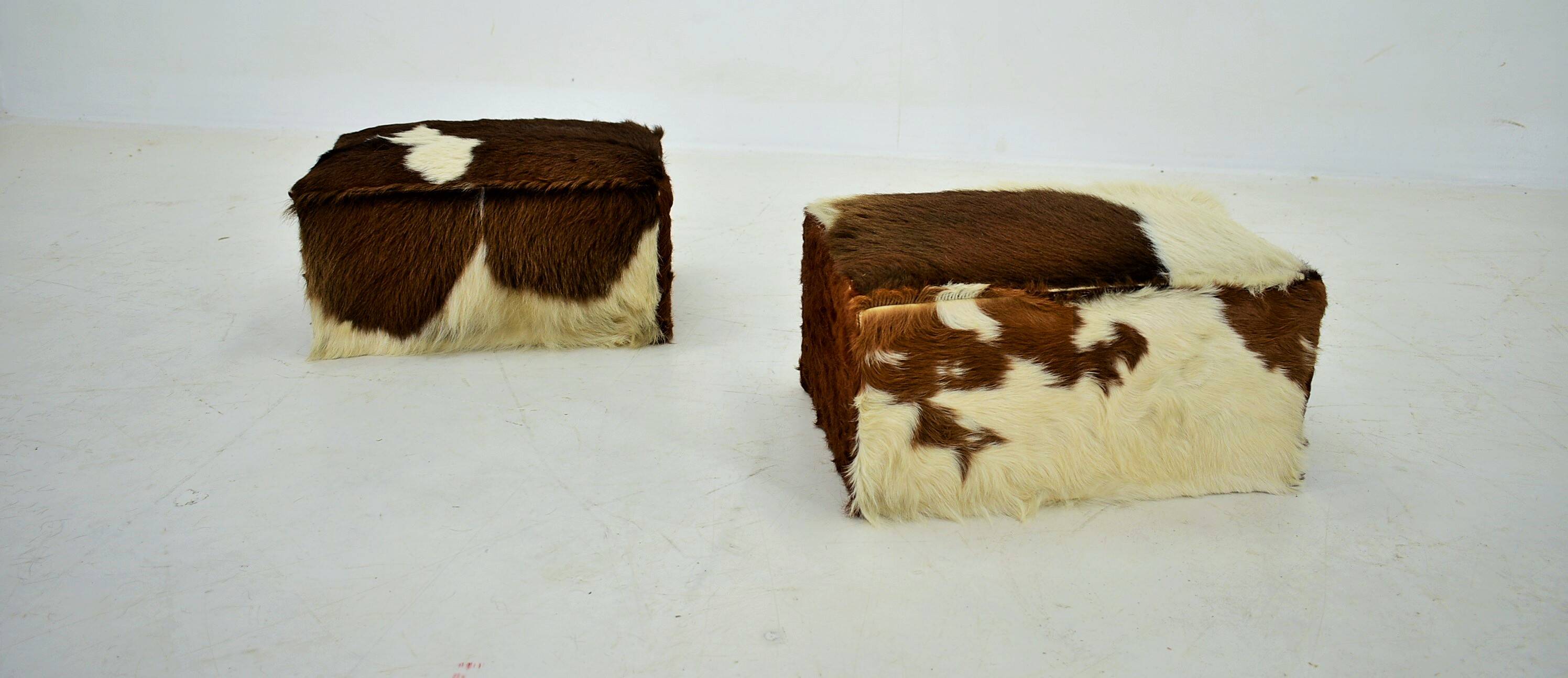 red brown leather cowhide footstools , poufs, 80s