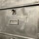 Industrial cladding furniture in brushed and patinated steel
