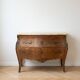 Curved Louis XV style commode in marquetry and marble.