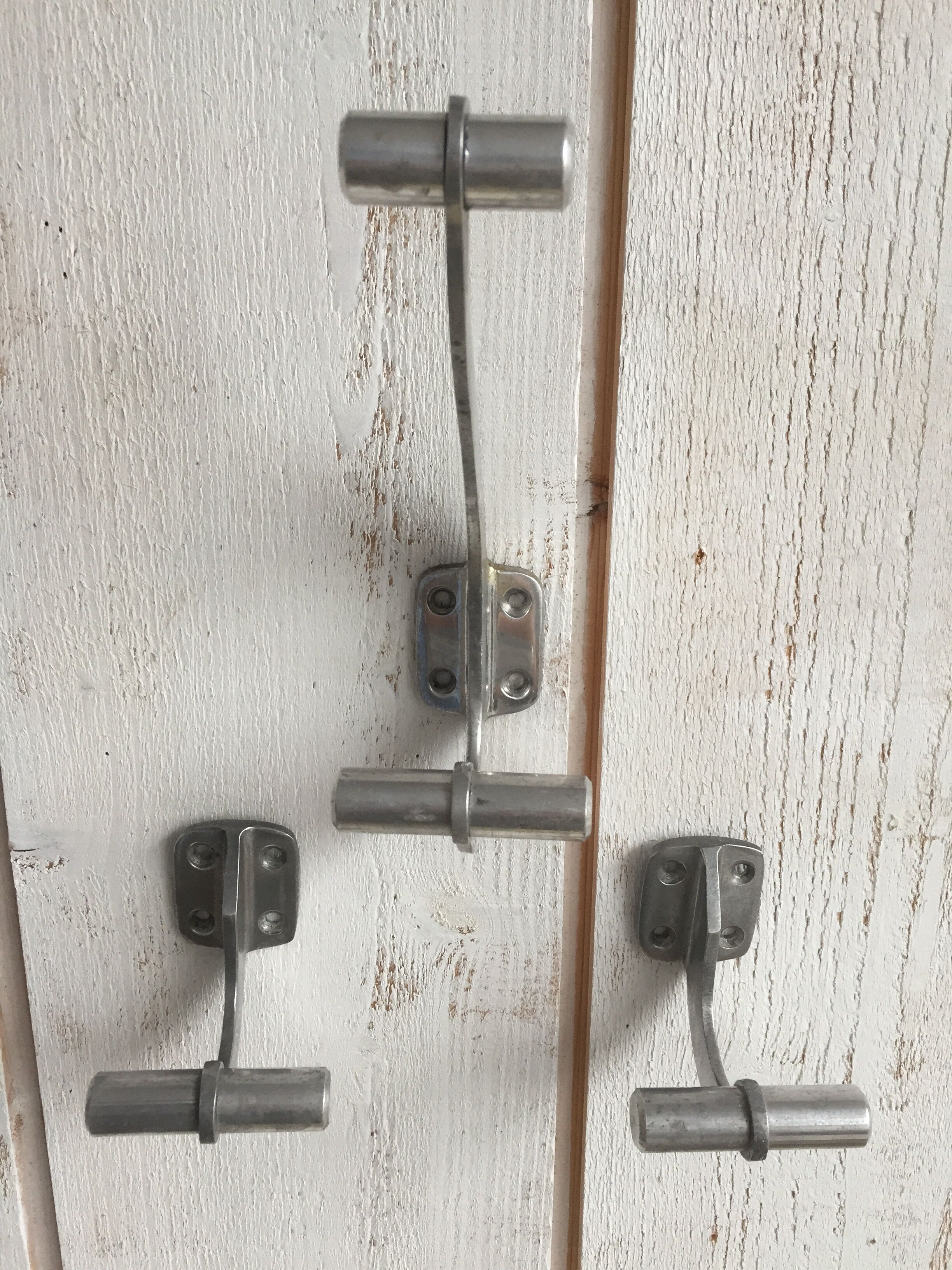 Trio of hooks art deco