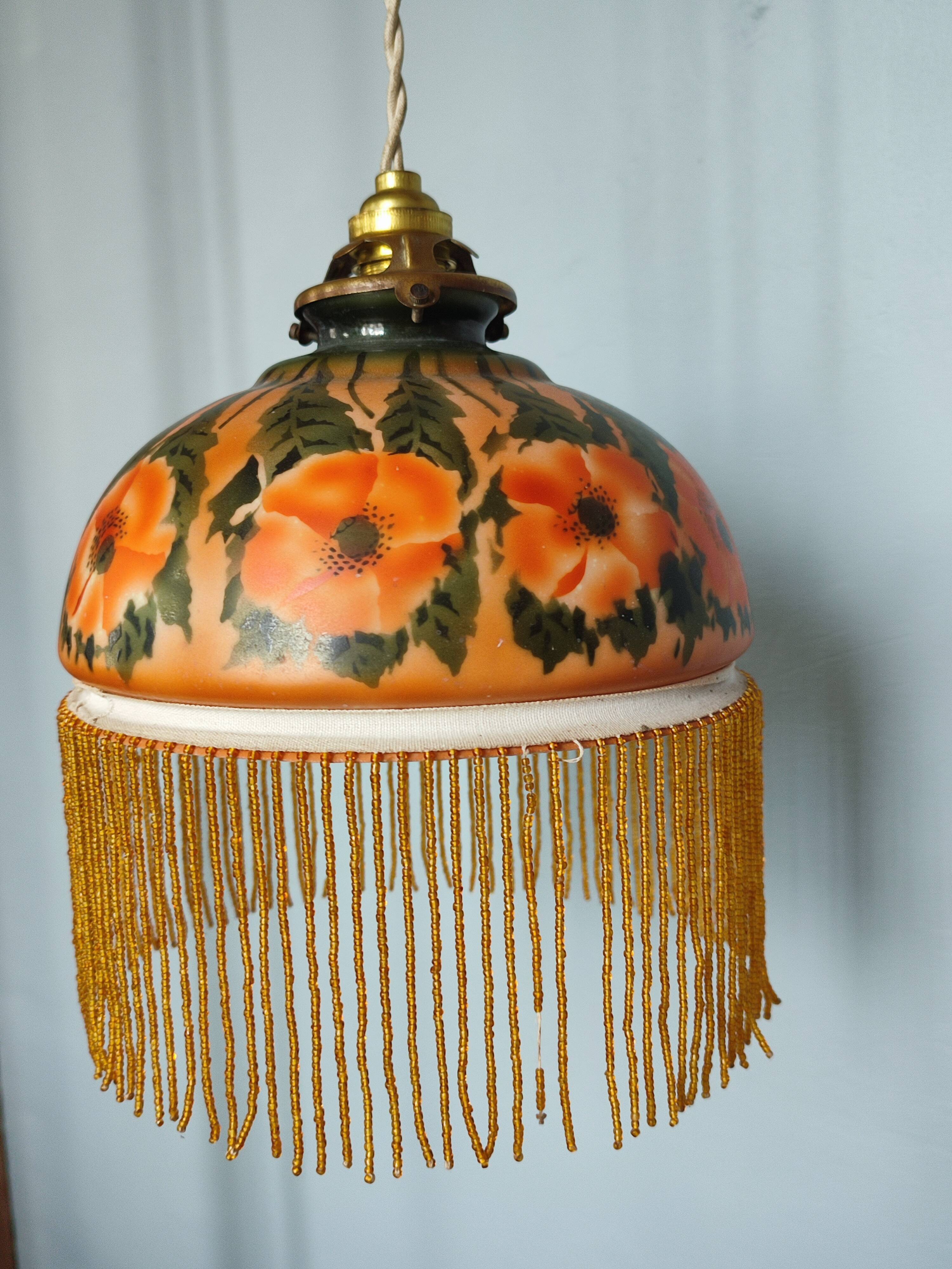 Old opaline and its tassels hanging lamp