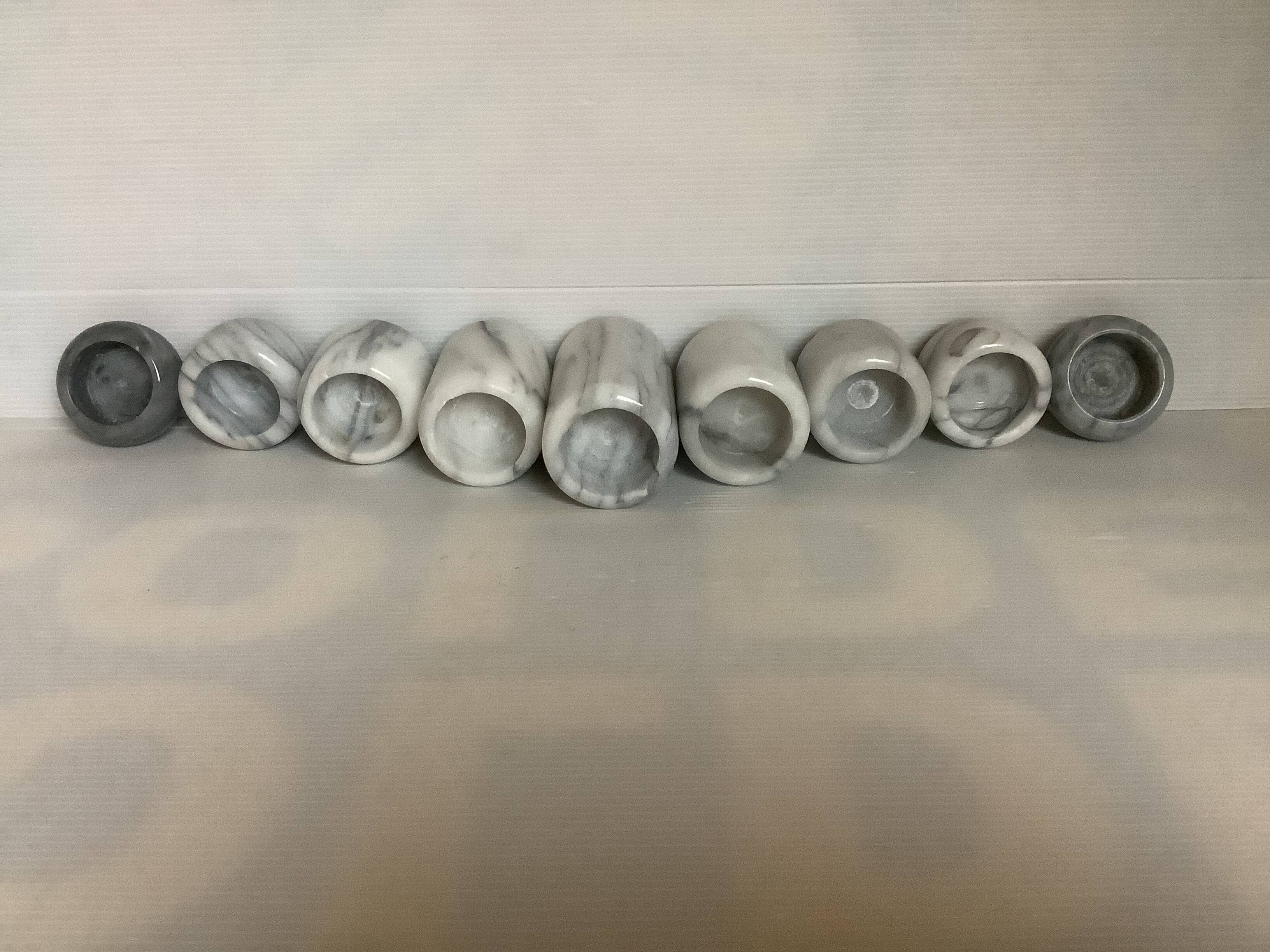 Nine marble candle holders