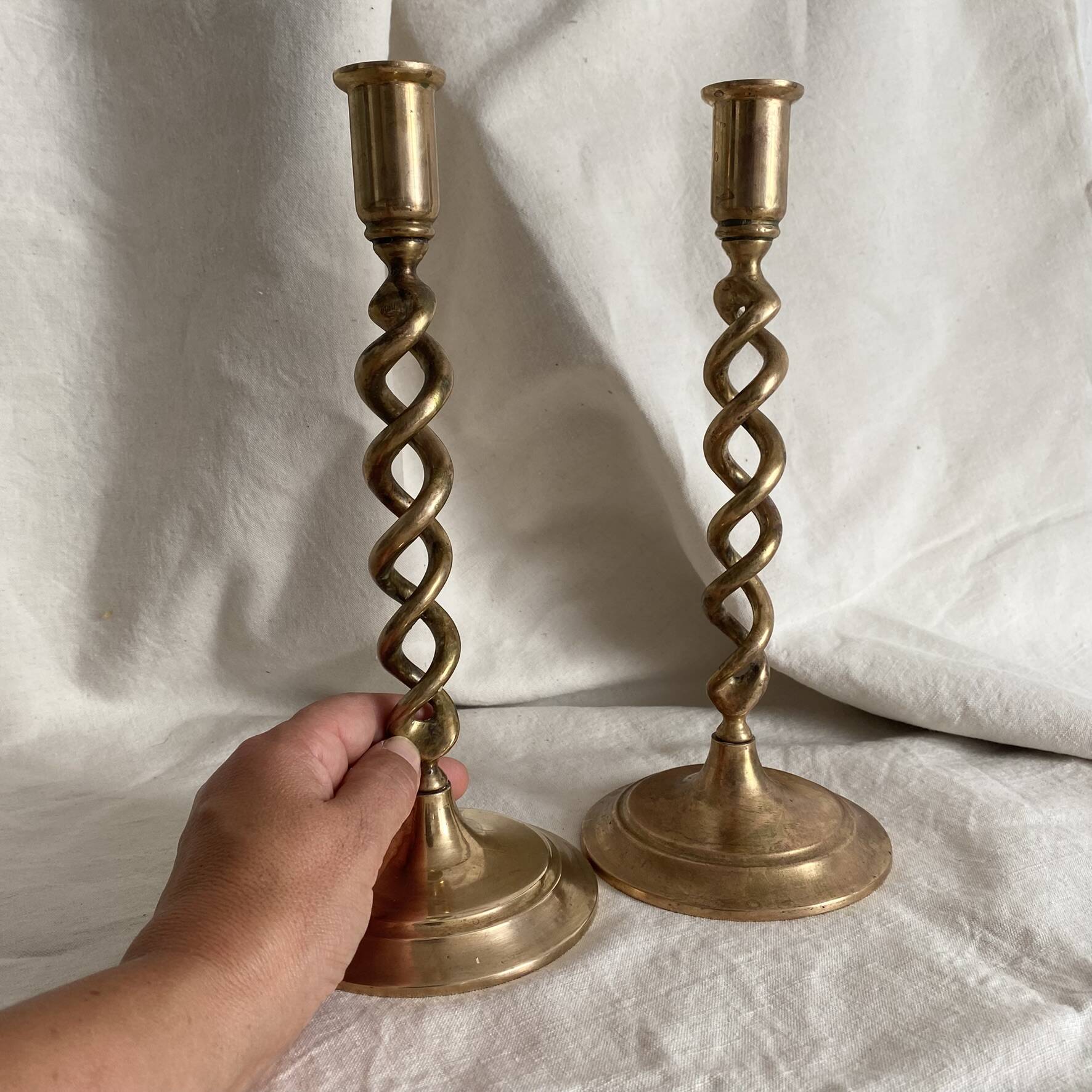 Pair of twisted brass candlesticks