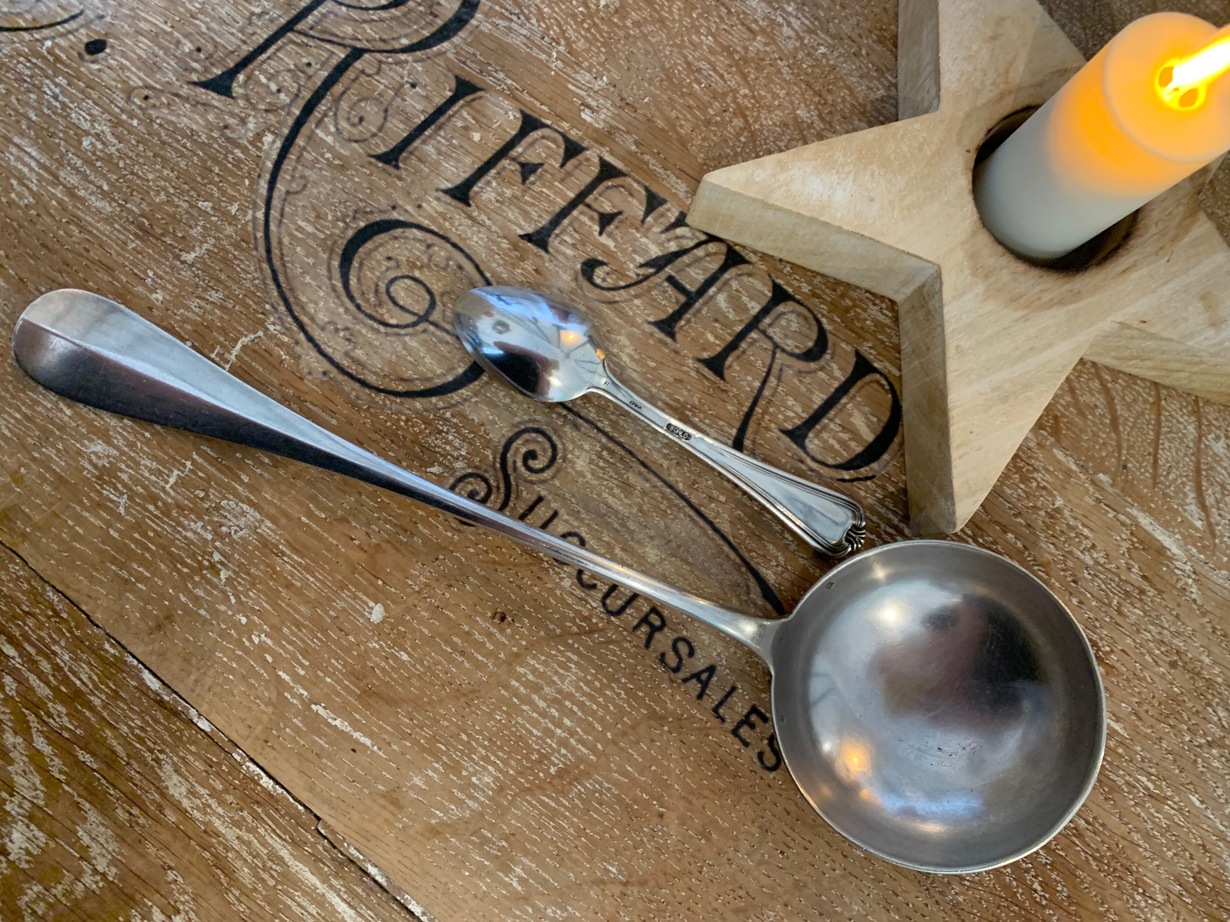 1 ladle and 1 spoon in silver