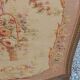Golden wooden fireplace screen and Aubusson tapestry, 19th century.