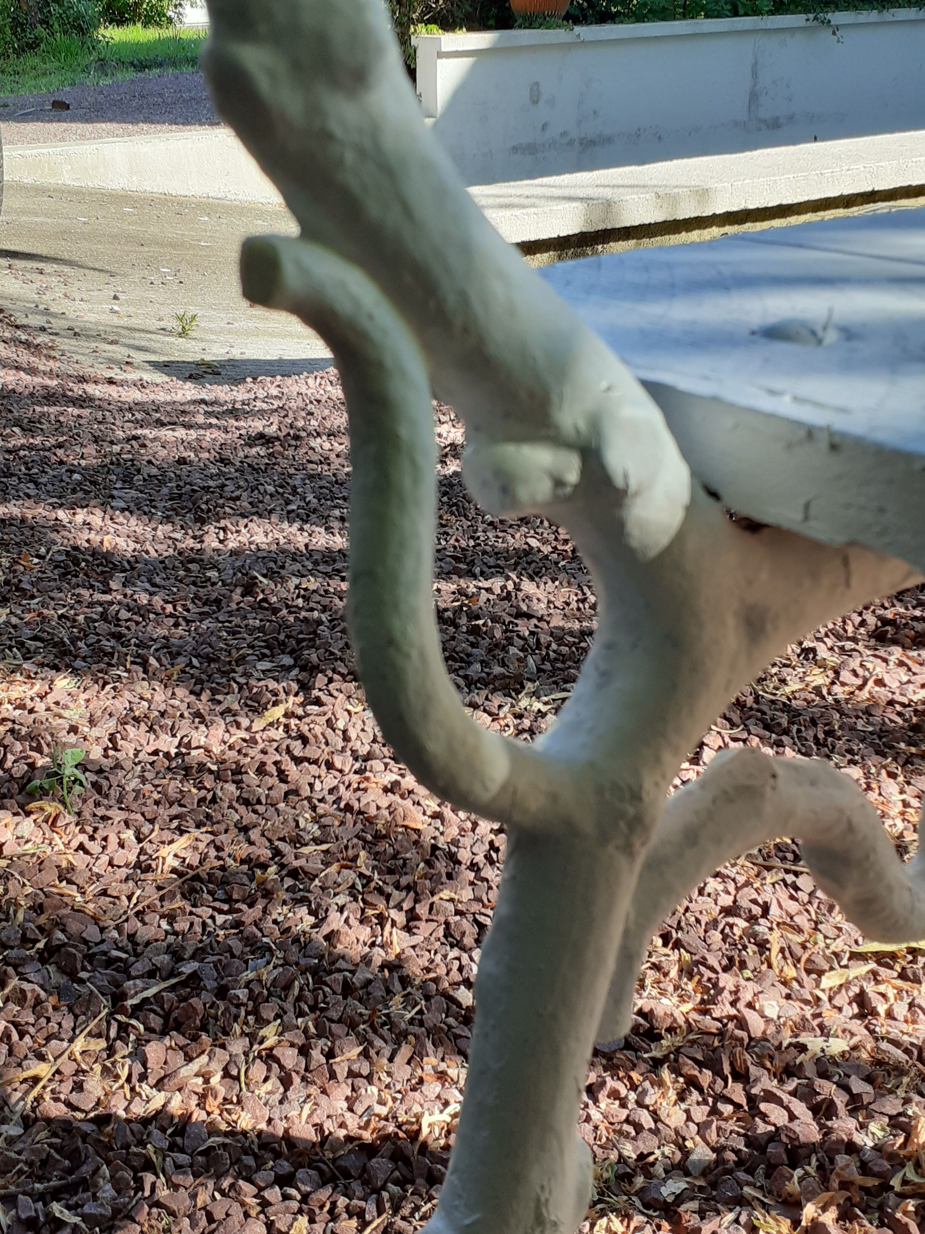 Old garden bench with cast iron feet and wooden planks