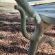 Old garden bench with cast iron feet and wooden planks