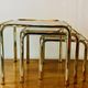 Vintage nesting tables in gold metal and smoked glass