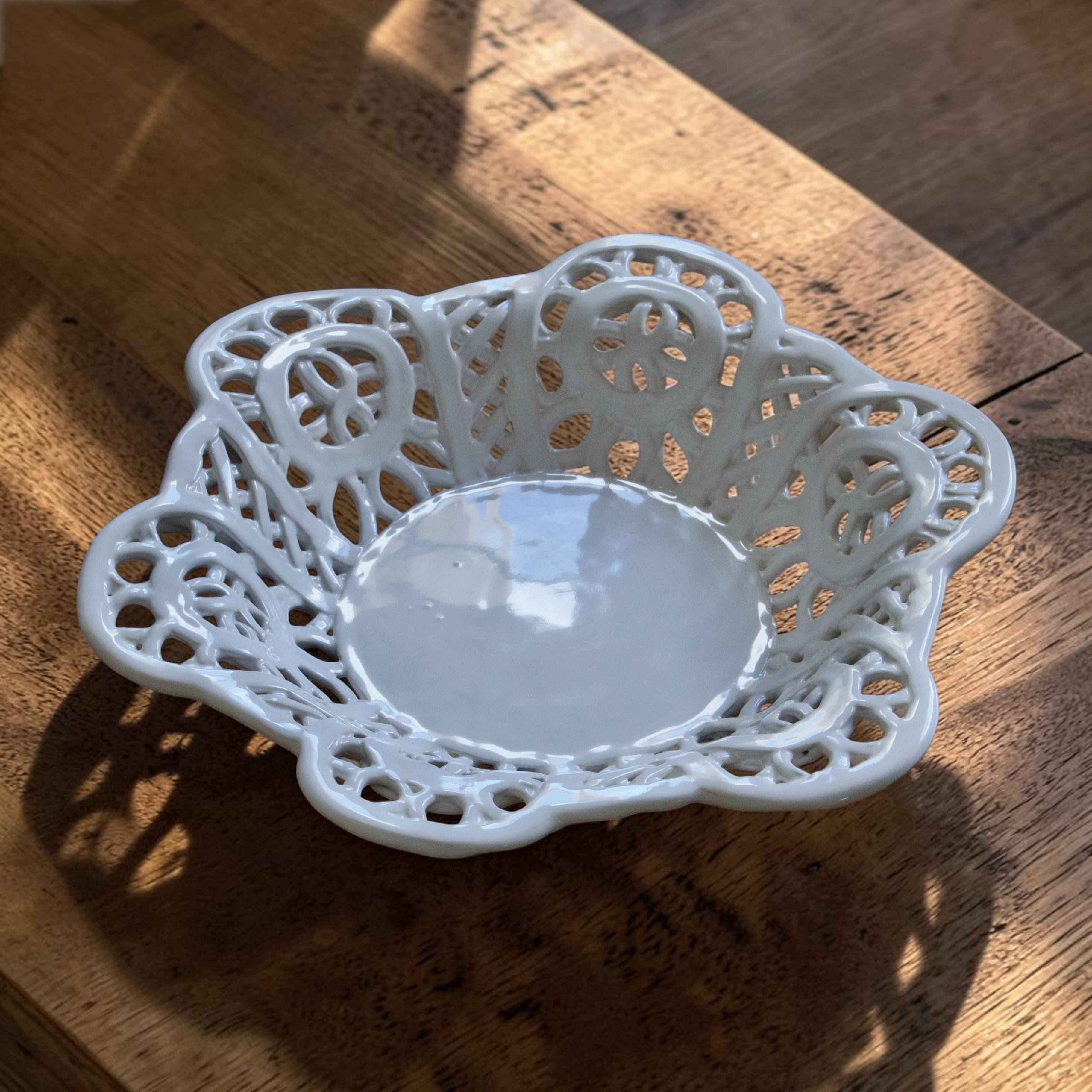 Vintage cup in openwork porcelain lace