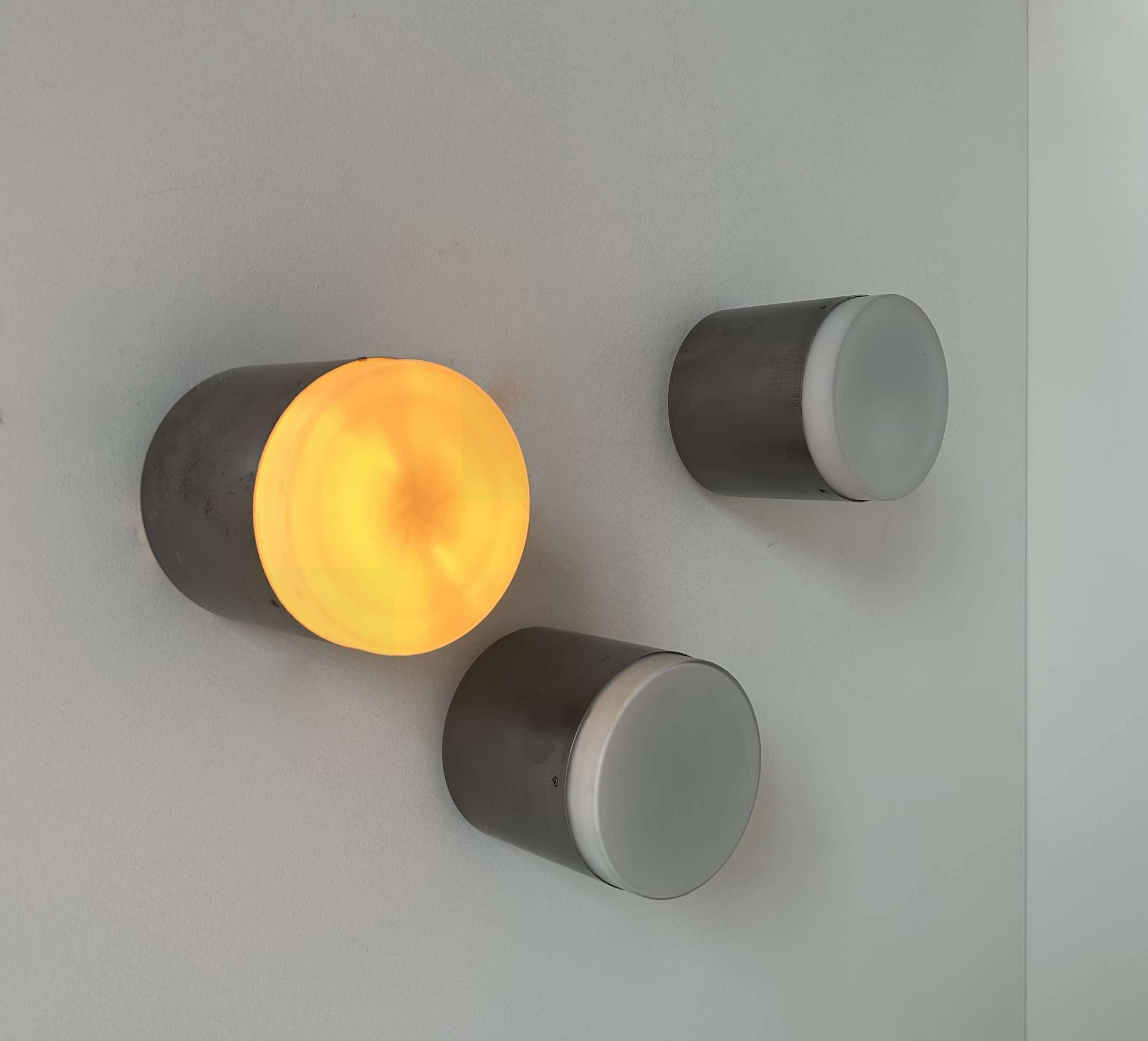 Set of 3 vintage Raak wall lights, aluminum and opaline, Holland 1960