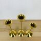 3 Scandinavian style gold-plated brass candle holders