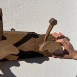 Wooden wall-mounted coat rack