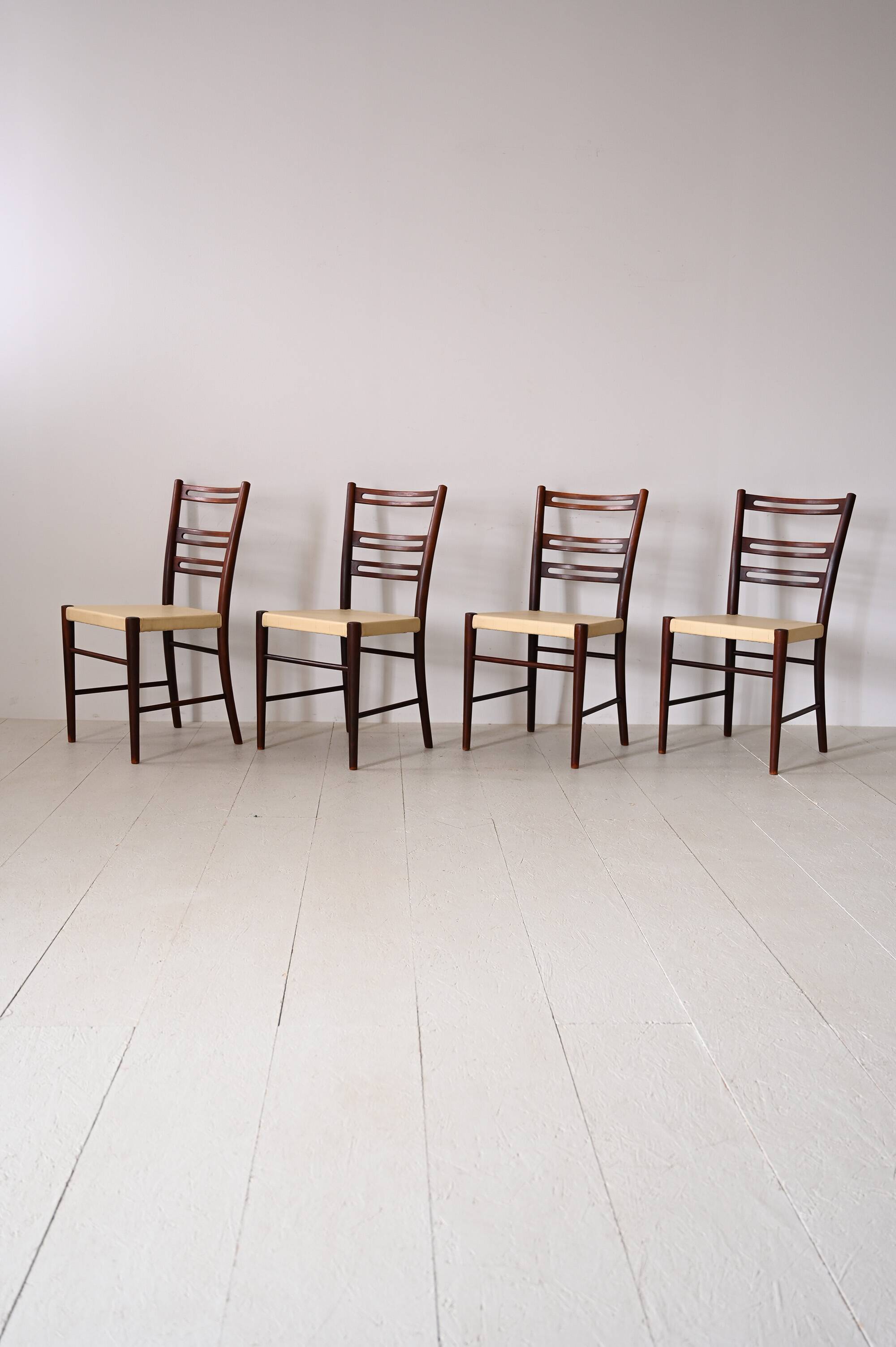 Scandinavian chairs in wood and leather