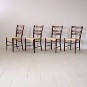 Scandinavian chairs in wood and leather