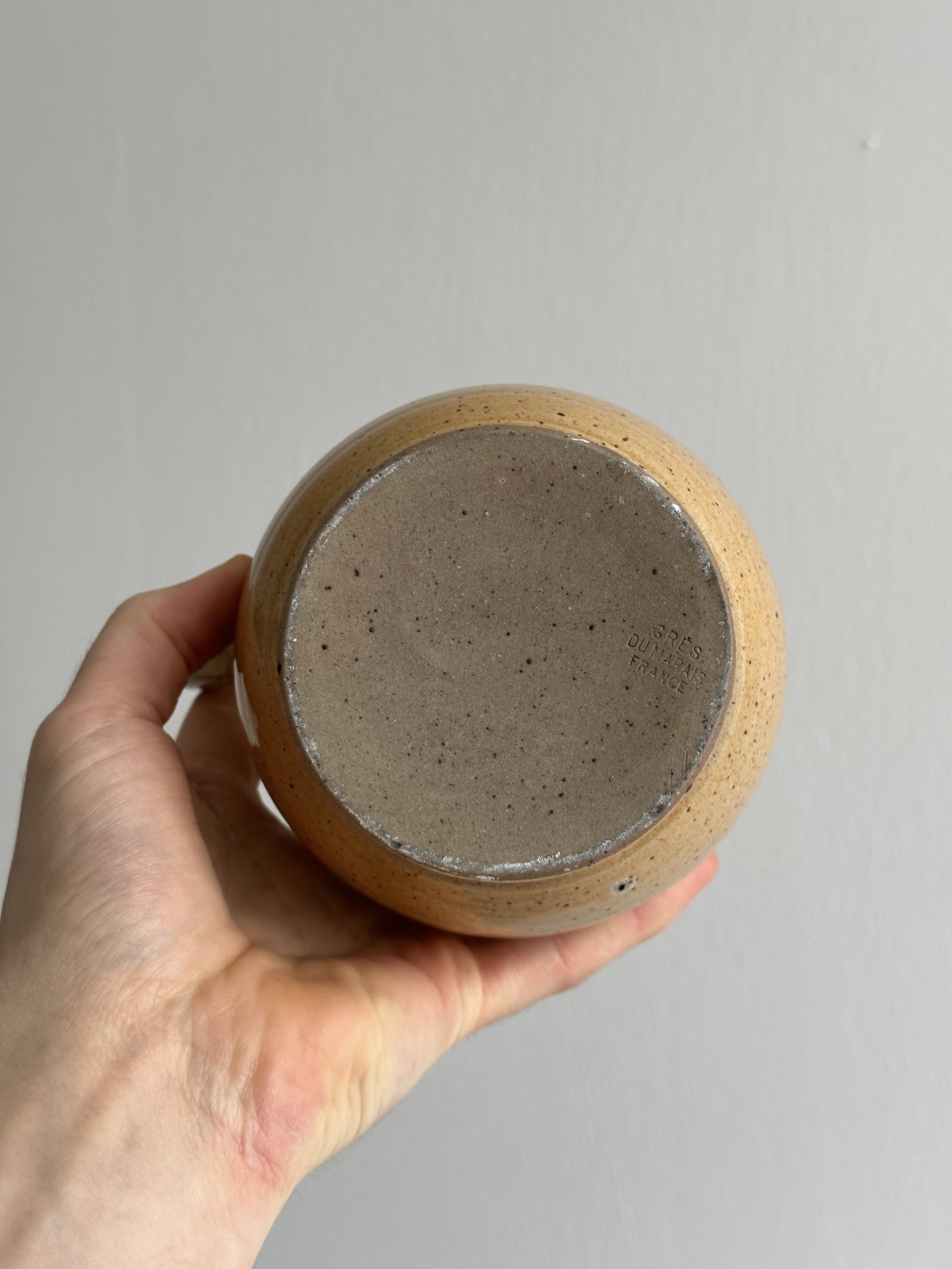 Hand-thrown ceramic pitcher