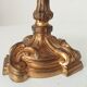 Antique 19th-century solid gilded bronze candlestick in the Louis XV style.
