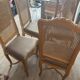 Four antique chairs in classic style with caning and upholstery.