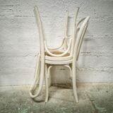Pair of white Baumann bistro chairs