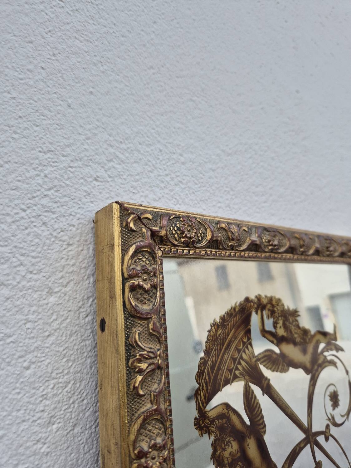 Antique gilded Venetian brasserie mirror in eglomised glass