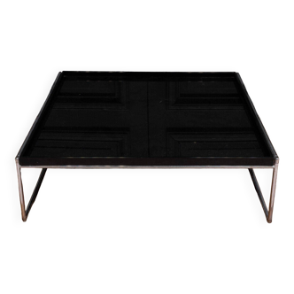 Table basse par Kartell plateau noir sur piètement chromé
