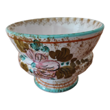 Hand-decorated earthenware cup