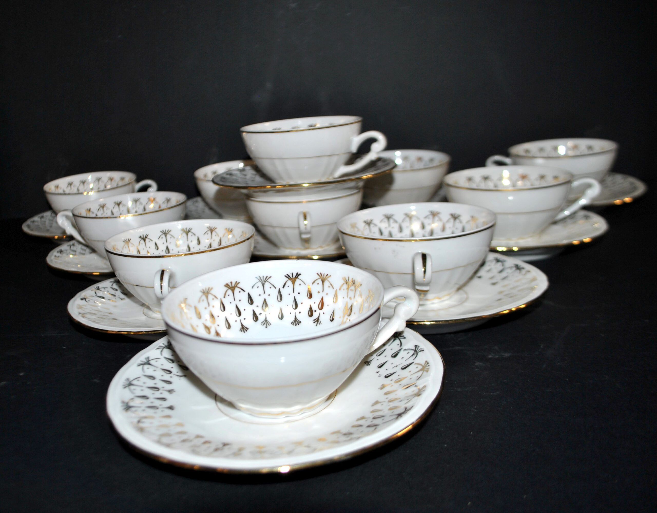 CNP set of 11 porcelain coffee cups from the National Porcelain Company Berry.
