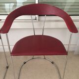 Pair of red chairs in 80s skai