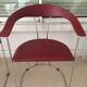 Pair of red chairs in 80s skai