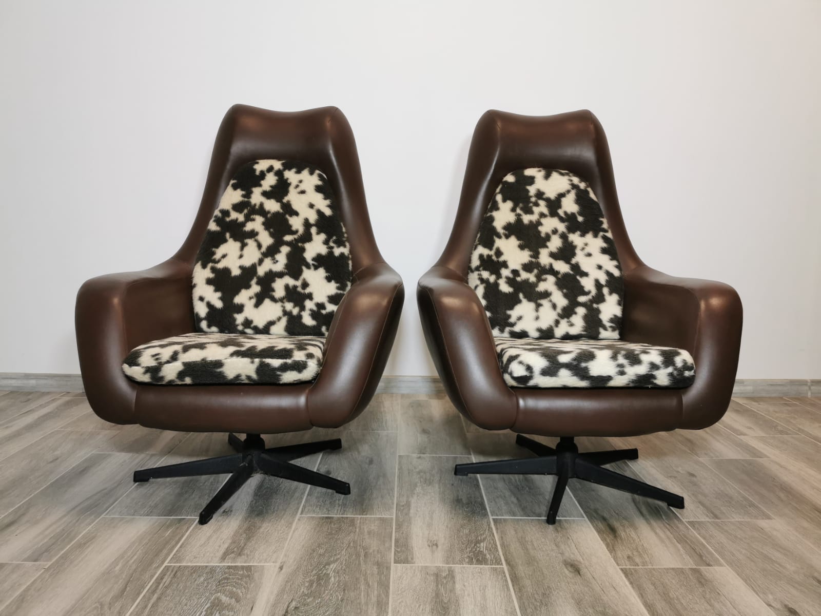 Mid century swivel armchairs